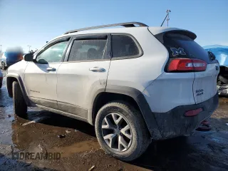 2015 Jeep Cherokee Trailhawk with VIN 1C4PJMBB5FW778883, listed as a Copart auction lot 44444555 with 113,194 mi miles and Salvage title. Bid and sale history available at DreamBid. Image 2.