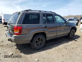 2000 Jeep Grand Cherokee Laredo z VIN 1J4GW48N9YC239166, wystawiony jako Copart lot #53321135 z przebiegiem 142 162 mil mil oraz Szkoda całkowita • Salvage title. Historia ofert i sprzedaży dostępna na DreamBid. Obrazek 3.
