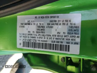 2011 Mazda 2 Touring z VIN JM1DE1HZ4B0115764, wystawiony jako Copart lot #56161455 z przebiegiem 134 274 mil mil oraz Szkoda całkowita • Salvage title. Historia ofert i sprzedaży dostępna na DreamBid. Obrazek 12.