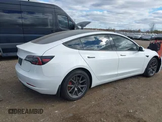 2023 Tesla Model 3 with VIN 5YJ3E1EA1PF384890, listed as a IAAI auction lot 40747791 with Not Provided miles and . Bid and sale history available at carsss.com. Image 4.