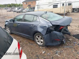 2015 Kia Optima LX with VIN 5XXGM4A70FG368949, listed as a IAAI auction lot 42393394 with 199,588 mi miles and . Bid and sale history available at DreamBid. Image 3.