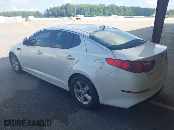 2015 Kia Optima LX with VIN KNAGM4A77F5568339, listed as a IAAI auction lot 42695740 with 135,632 mi miles and . Bid and sale history available at DreamBid. Image 3.