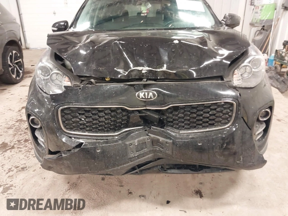 2019 Kia Sportage EX with VIN KNDPNCAC0K7606712, listed as a IAAI auction lot 41652131 with 71,013 mi miles. Bid and sale history available at carsss.com. Image 6.