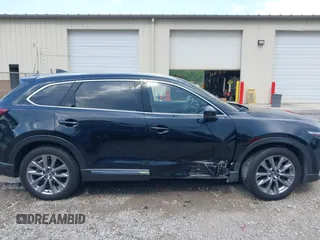 2022 Mazda CX-9 Grand Touring with VIN JM3TCBDYXN0627657, listed as a IAAI auction lot 42498856 with 61,044 mi miles and . Bid and sale history available at DreamBid. Image 13.
