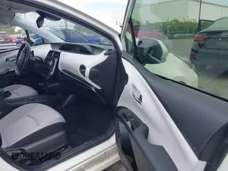 2019 Toyota Prius L Eco z VIN JTDKARFU3K3102222, wystawiony jako IAAI lot #42291403 z przebiegiem 27 669 mil mil oraz . Historia ofert i sprzedaży dostępna na DreamBid. Obrazek 5.
