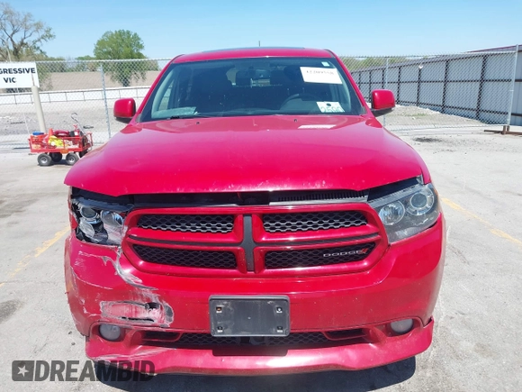 2013 Dodge Durango R/T with VIN 1C4SDJCTXDC697240, listed as a IAAI auction lot 42209558 with 130,735 mi miles and . Bid and sale history available at DreamBid. Image 12.