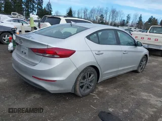 2018 Hyundai Elantra SEL with VIN 5NPD84LF8JH239866, listed as a IAAI auction lot 41597467 with 164,151 mi miles and . Bid and sale history available at DreamBid. Image 4.