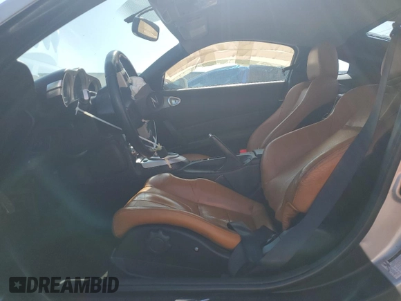 2008 Nissan 350Z Touring z VIN JN1BZ34EX8M753158, wystawiony jako Copart lot #57711145 z przebiegiem 113 142 mil mil oraz Szkoda całkowita • Salvage title. Historia ofert i sprzedaży dostępna na DreamBid. Obrazek 7.