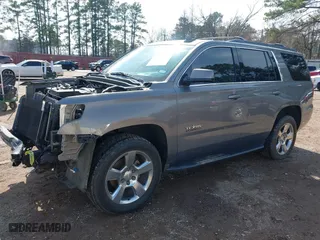 2017 Chevrolet Tahoe LT with VIN 1GNSCBKC2HR260627, listed as a IAAI auction lot 41580613 with 156,650 mi miles. Bid and sale history available at carsss.com. Image 20.