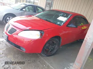 2007 Pontiac G6 with VIN 1G2ZG58B274108634, listed as a IAAI auction lot 42005168 with 239,053 mi miles. Bid and sale history available at carsss.com. Image 2.