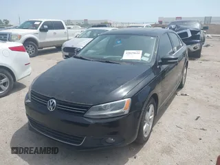 2012 Volkswagen Jetta TDI w/Premium with VIN 3VWLL7AJ0CM360730, listed as a IAAI auction lot 42029644 with 159,074 mi miles and . Bid and sale history available at DreamBid. Image 2.