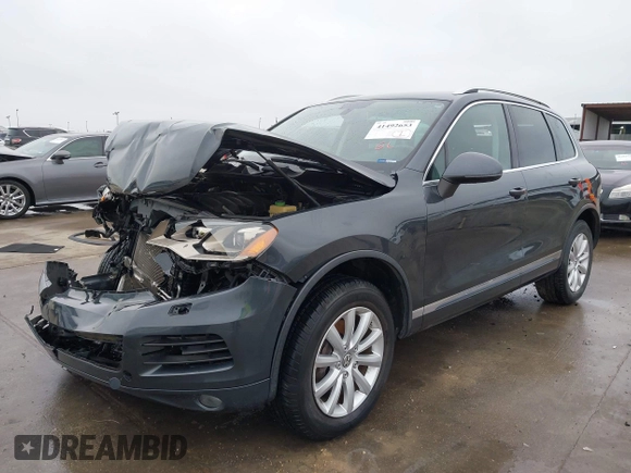 2012 Volkswagen Touareg Sport with VIN WVGEF9BP9CD008545, listed as a IAAI auction lot 41492653 with 138,424 mi miles and . Bid and sale history available at DreamBid. Image 20.