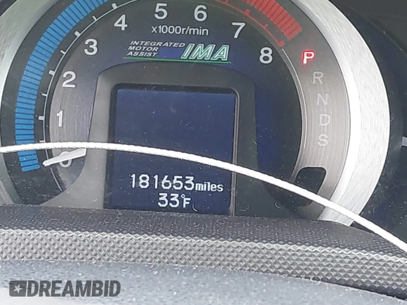 2010 Honda Insight EX with VIN JHMZE2H71AS035091, listed as a IAAI auction lot 41380128 with 181,653 mi miles and . Bid and sale history available at DreamBid. Image 16.