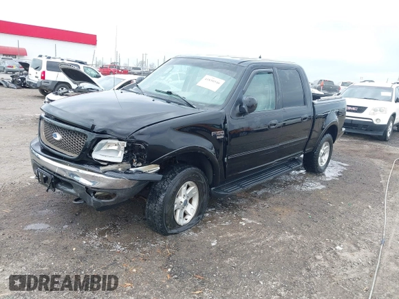 2002 Ford F-150 XLT with VIN 1FTRW08L32KD90202, listed as a IAAI auction lot 41850546 with 256,807 mi miles. Bid and sale history available at carsss.com. Image 22.