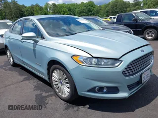 2014 Ford Fusion SE Hybrid with VIN 3FA6P0LU7ER154559, listed as a IAAI auction lot 42198548 with 244,630 mi miles. Bid and sale history available at carsss.com. Image 1.
