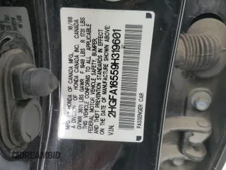 2009 Honda Civic LX z VIN 2HGFA16559H319601, wystawiony jako Copart lot #54408975 z przebiegiem 143 093 mil mil oraz Szkoda całkowita • Salvage title. Historia ofert i sprzedaży dostępna na DreamBid. Obrazek 12.