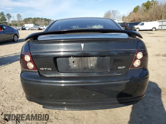 2004 Pontiac GTO z VIN 6G2VX12G74L249425, wystawiony jako Copart lot #48103235 z przebiegiem 106 334 mil mil oraz Szkoda całkowita • Salvage title. Historia ofert i sprzedaży dostępna na DreamBid. Obrazek 6.