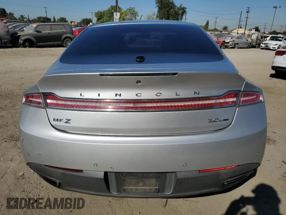 2015 Lincoln MKZ z VIN 3LN6L2G9XFR610736, wystawiony jako Copart lot #80662274 z przebiegiem 101 441 mil mil oraz Szkoda całkowita • Salvage title. Historia ofert i sprzedaży dostępna na DreamBid. Obrazek 6.