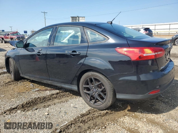 2016 Ford Focus SE with VIN 1FADP3F21GL228871, listed as a Copart auction lot 63506525 with 62,756 mi miles and Salvage title. Bid and sale history available at DreamBid. Image 2.
