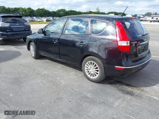 2010 Hyundai Elantra Touring GLS with VIN KMHDB8AE7AU075949, listed as a IAAI auction lot 41426249 with 231,611 mi miles. Bid and sale history available at carsss.com. Image 3.