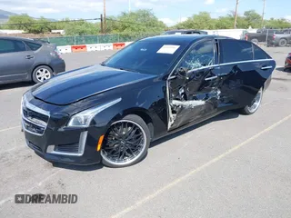 2016 Cadillac CTS Sedan Luxury Collection RWD with VIN 1G6AR5SX8G0167026, listed as a IAAI auction lot 41526996 with 76,612 mi miles. Bid and sale history available at carsss.com. Image 2.