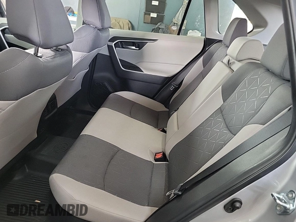 2023 Toyota RAV4 Hybrid XLE with VIN 2T3RWRFV9PW175446, listed as a IAAI auction lot 42806880 with 90,261 mi miles and . Bid and sale history available at DreamBid. Image 3.