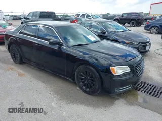 2014 Chrysler 300 z VIN 2C3CCAAG6EH220935, wystawiony jako IAAI lot #42216498 z przebiegiem 153 539 mil mil oraz . Historia ofert i sprzedaży dostępna na DreamBid. Obrazek 1.
