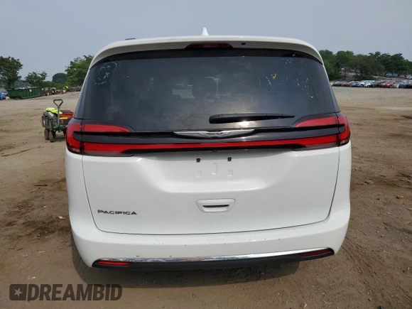 2022 Chrysler Pacifica Touring L z VIN 2C4RC1BG0NR218354, wystawiony jako Copart lot #60761565 z przebiegiem 55 087 mil mil oraz Nie do naprawy • Non repairable. Historia ofert i sprzedaży dostępna na DreamBid. Obrazek 6.