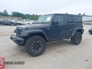 2016 Jeep Wrangler Unlimited Rubicon with VIN 1C4HJWFG6GL346862, listed as a IAAI auction lot 42441610 with 94,227 mi miles and . Bid and sale history available at DreamBid. Image 2.