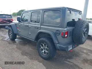 2020 Jeep Wrangler Unlimited Rubicon z VIN 1C4HJXFG7LW193665, wystawiony jako IAAI lot #41874930 z przebiegiem 58 884 mil mil oraz . Historia ofert i sprzedaży dostępna na DreamBid. Obrazek 3.