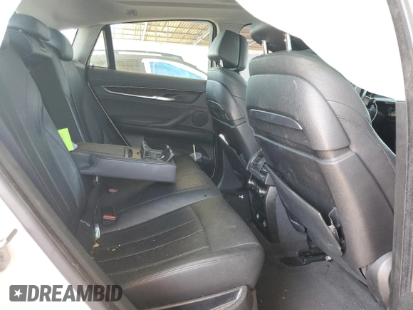 2016 BMW X6 sDrive35i with VIN 5UXKU0C59G0F93163, listed as a Copart auction lot 74148464 with 110,811 mi miles and Salvage Title. Bid and sale history available at carsss.com. Image 11.