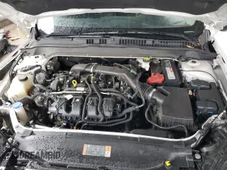 2020 Ford Fusion SE z VIN 3FA6P0T92LR173321, wystawiony jako Copart lot #86585494 z przebiegiem 102 285 mil mil oraz Szkoda całkowita • Salvage title. Historia ofert i sprzedaży dostępna na DreamBid. Obrazek 12.
