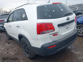 2012 Kia Sorento LX with VIN 5XYKTCA67CG308138, listed as a IAAI auction lot 41674753 with 162,367 mi miles. Bid and sale history available at carsss.com. Image 3.