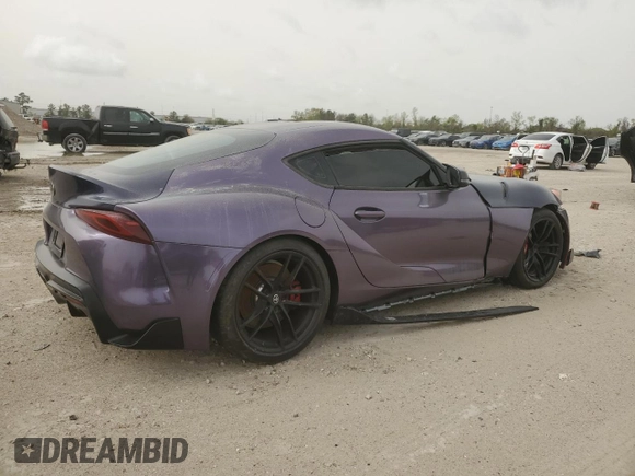 2022 Toyota Supra 3.0 z VIN WZ1DB0C03NW050968, wystawiony jako Copart lot #44450175 z przebiegiem 22 420 mil mil oraz Szkoda całkowita • Salvage title. Historia ofert i sprzedaży dostępna na DreamBid. Obrazek 3.