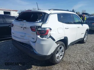 2023 Jeep Compass Latitude with VIN 3C4NJDBN7PT561666, listed as a IAAI auction lot 41956815 with 49,392 mi miles and . Bid and sale history available at DreamBid. Image 4.