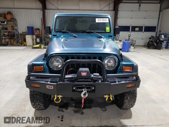 1998 Jeep Wrangler SE with VIN 1J4FY29P5WP742855, listed as a Copart auction lot 52818845 with 196,902 mi miles and Clean Title. Bid and sale history available at carsss.com. Image 5.