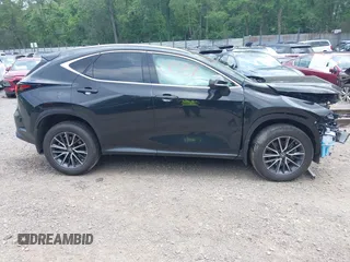 2023 Lexus NX 350h Premium z VIN 2T2GKCEZXPC012895, wystawiony jako IAAI lot #42690037 z przebiegiem 31 197 mil mil oraz . Historia ofert i sprzedaży dostępna na DreamBid. Obrazek 14.