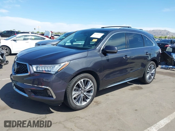 2019 Acura MDX Technology with VIN 5J8YD4H5XKL029023, listed as a IAAI auction lot 42108214 with 73,535 mi miles and . Bid and sale history available at DreamBid. Image 17.