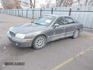 2004 Hyundai XG with VIN KMHFU45E14A355782, listed as a IAAI auction lot 41357500 with 138,236 mi miles. Bid and sale history available at carsss.com. Image 2.
