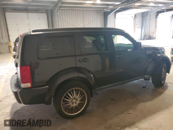 2008 Dodge Nitro SXT z VIN 1D8GT28K28W246131, wystawiony jako Copart lot #60037665 z przebiegiem 119 831 mil mil oraz Szkoda całkowita • Salvage title. Historia ofert i sprzedaży dostępna na DreamBid. Obrazek 3.