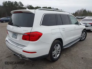 2014 Mercedes-Benz GL 450 z VIN 4JGDF7CE5EA390994, wystawiony jako IAAI lot #41618791 z przebiegiem 130 492 mil mil oraz . Historia ofert i sprzedaży dostępna na DreamBid. Obrazek 4.