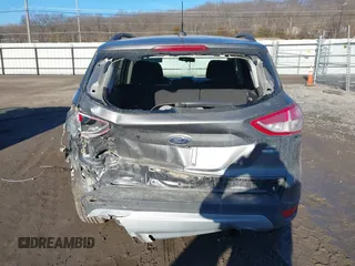 2014 Ford Escape SE z VIN 1FMCU9GXXEUB99093, wystawiony jako IAAI lot #41662040 z przebiegiem 120 783 mil mil oraz . Historia ofert i sprzedaży dostępna na DreamBid. Obrazek 17.