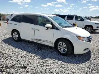 2014 Honda Odyssey EX-L with VIN 5FNRL5H63EB101062, listed as a Copart auction lot 56656825 with 183,871 mi miles and Salvage title. Bid and sale history available at DreamBid. Image 4.