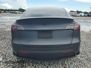 2022 Tesla Model Y Performance с VIN 7SAYGDEF0NF497582, выставлен на аукционе Copart как лот 65131685 с пробегом 50 948 миль миль и Чистый • Clean title. История ставок и продаж доступна на DreamBid. Изображение 6.