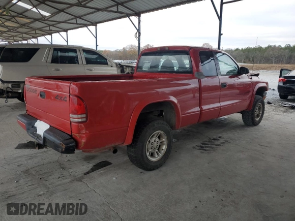 1999 Dodge Dakota SLT with VIN 1B7GG22Y5XS276472, listed as a Copart auction lot 85417774 with 264,833 mi miles and Salvage Title. Bid and sale history available at DreamBid. Image 3.