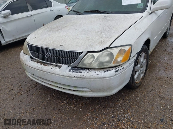 2001 Toyota Avalon XL z VIN 4T1BF28B31U182971, wystawiony jako IAAI lot #42276391 z przebiegiem 226 582 mil mil oraz . Historia ofert i sprzedaży dostępna na DreamBid. Obrazek 6.