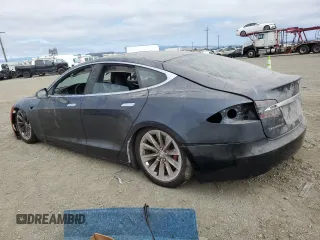 2016 Tesla Model S 90D z VIN 5YJSA1E41GF171522, wystawiony jako Copart lot #59966545 z przebiegiem Nie podano mil oraz Szkoda całkowita • Salvage title. Historia ofert i sprzedaży dostępna na DreamBid. Obrazek 2.