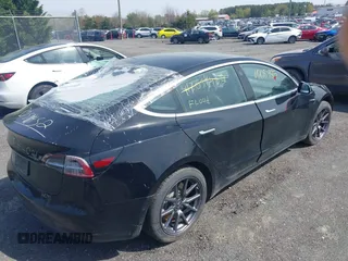 2019 Tesla Model 3 Mid Range with VIN 5YJ3E1EA0KF394514, listed as a IAAI auction lot 42080985 with Not Provided miles and . Bid and sale history available at DreamBid. Image 4.