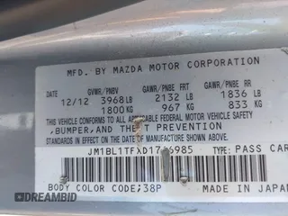 2013 Mazda 3 i SV with VIN JM1BL1TFXD1766985, listed as a IAAI auction lot 42033758 with 144,018 mi miles and . Bid and sale history available at DreamBid. Image 9.
