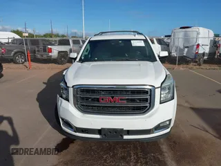 2015 GMC Yukon XL SLT with VIN 1GKS1HKC2FR612690, listed as a IAAI auction lot 41234188 with 113,830 mi miles. Bid and sale history available at carsss.com. Image 12.
